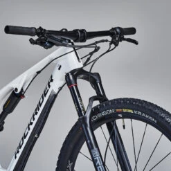 Rockrider Vélo VTT Cross Country XC 900 S Cadre Carbone Et Aluminium Blanc 11 Rockrider Vélo VTT Cross Country XC 900 S Cadre Carbone Et Aluminium Blanc -Vélos Équipement Magasin velo vtt cross country xc 900 s cadre carbone et aluminium blanc 9